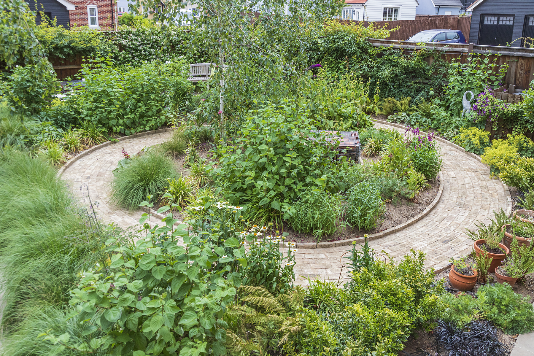 Traditional Garden Bradfield Essex. Design and Build Cube 1994. Unfurling path