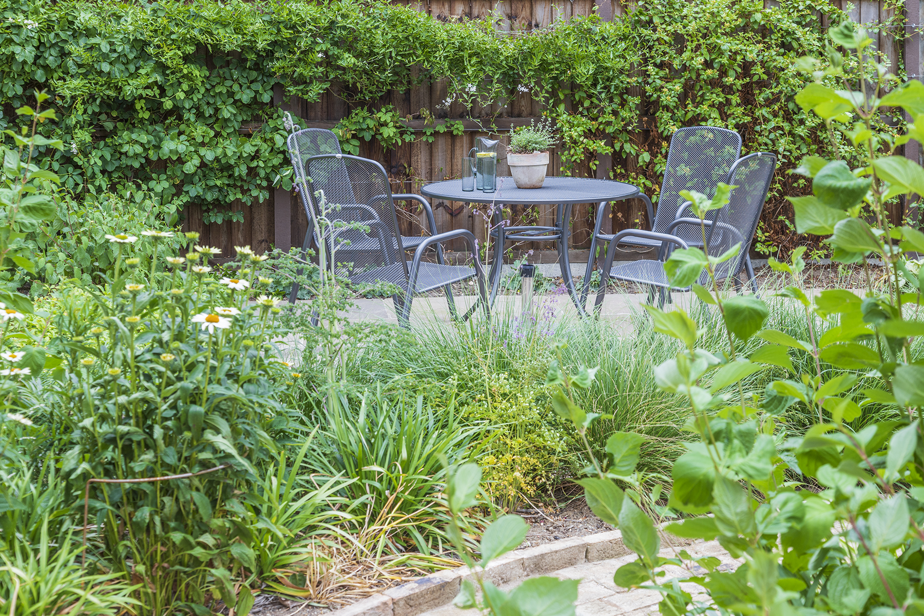 Traditional Garden Bradfield Essex. Design and Build Cube 1994. Dining Area