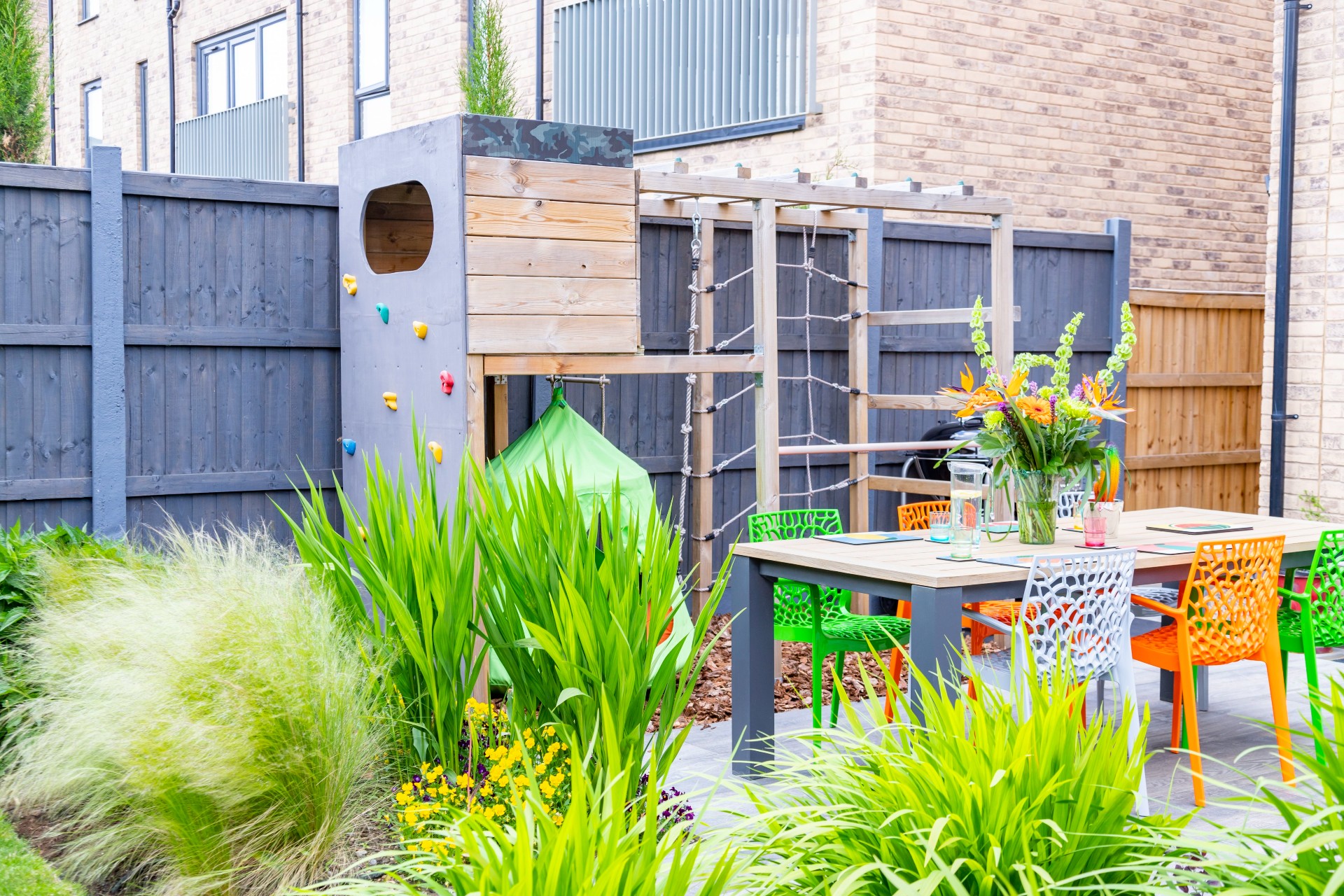 Small Urban Garden Tropical Planting Dining Play Area Essex